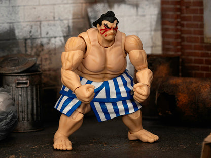 E. Honda 6.5" Moveable Figure with Accessories and Alternate Head Hands "Ultra Street Fighter II: The Final Challengers" (2017) Video Game Model by Jada <h2>E. Jada</h2> <p>High-quality diecast car pe