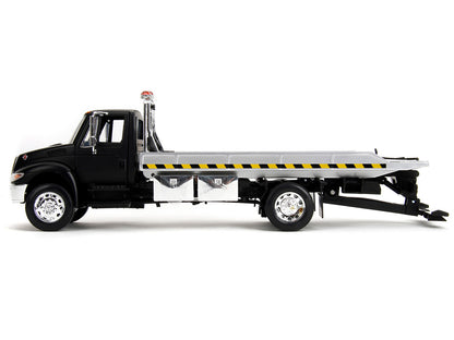 International DuraStar 4400 Flatbed Tow Truck Matt Black 1/24 Diecast Model Car by Jada <h2>International Jada</h2> <p>High-quality perfect for collectors and enthusiasts. Features detailed interior e