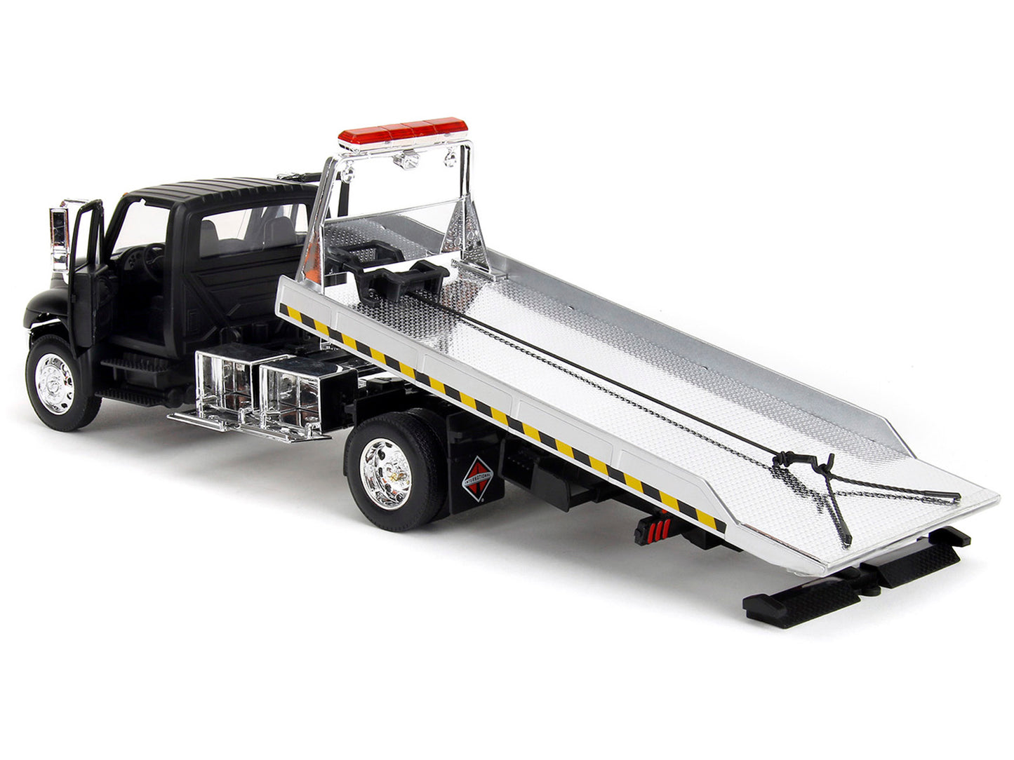 International DuraStar 4400 Flatbed Tow Truck Matt Black 1/24 Diecast Model Car by Jada <h2>International Jada</h2> <p>High-quality perfect for collectors and enthusiasts. Features detailed interior e