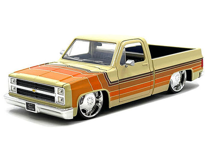 1985 Chevrolet C-10 Pickup Truck Beige with Stripes and Lowenhart Wheels "Just Trucks" Series 1/24 Diecast Model Car by Jada <h2>1985 Jada</h2> <p>High-quality perfect for collectors enthusiasts. Feat