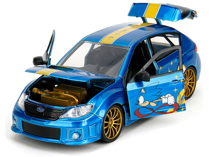 2012 Subaru Impreza WRX STI Blue Metallic with Graphics and Sonic The Hedgehog Diecast Figure "Sonic Hedgehog" "Hollywood Rides" Series 1/24 Model Car by Jada <h2>2012 Jada</h2> <p>High-quality perfec