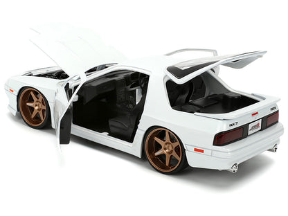 1985 Mazda RX-7 White "JDM Tuners" Series 1/24 Diecast Model Car by Jada <h2>1985 Jada</h2> <p>High-quality perfect for collectors and enthusiasts. Features detailed interior exterior craftsmanship, r