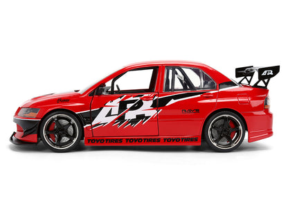 Sean's Mitsubishi Lancer Evolution IX RHD (Right Hand Drive) Red with Graphics "The Fast and the Furious: Tokyo Drift" (2006) Movie "Fast & Furious 25 Years" Series 1/24 Diecast Model Car by Jada <h2>