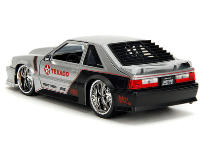1989 Ford Mustang GT "Texaco" Silver Metallic and Matt Black "Bigtime Muscle" Series 1/24 Diecast Model Car by Jada <h2>1989 Jada</h2> <p>High-quality perfect for collectors enthusiasts. Features deta
