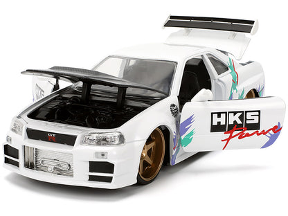 2002 Nissan Skyline GT-R (R34) RHD (Right Hand Drive) "HKS Power" White with Carbon Hood and Graphics "JDM Tuners" Series 1/24 Diecast Model Car by Jada <h2>2002 Jada</h2> <p>High-quality perfect for