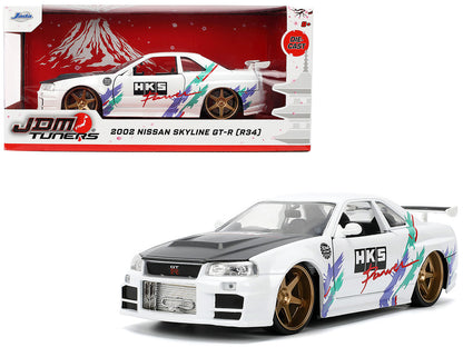 2002 Nissan Skyline GT-R (R34) RHD (Right Hand Drive) "HKS Power" White with Carbon Hood and Graphics "JDM Tuners" Series 1/24 Diecast Model Car by Jada <h2>2002 Jada</h2> <p>High-quality perfect for