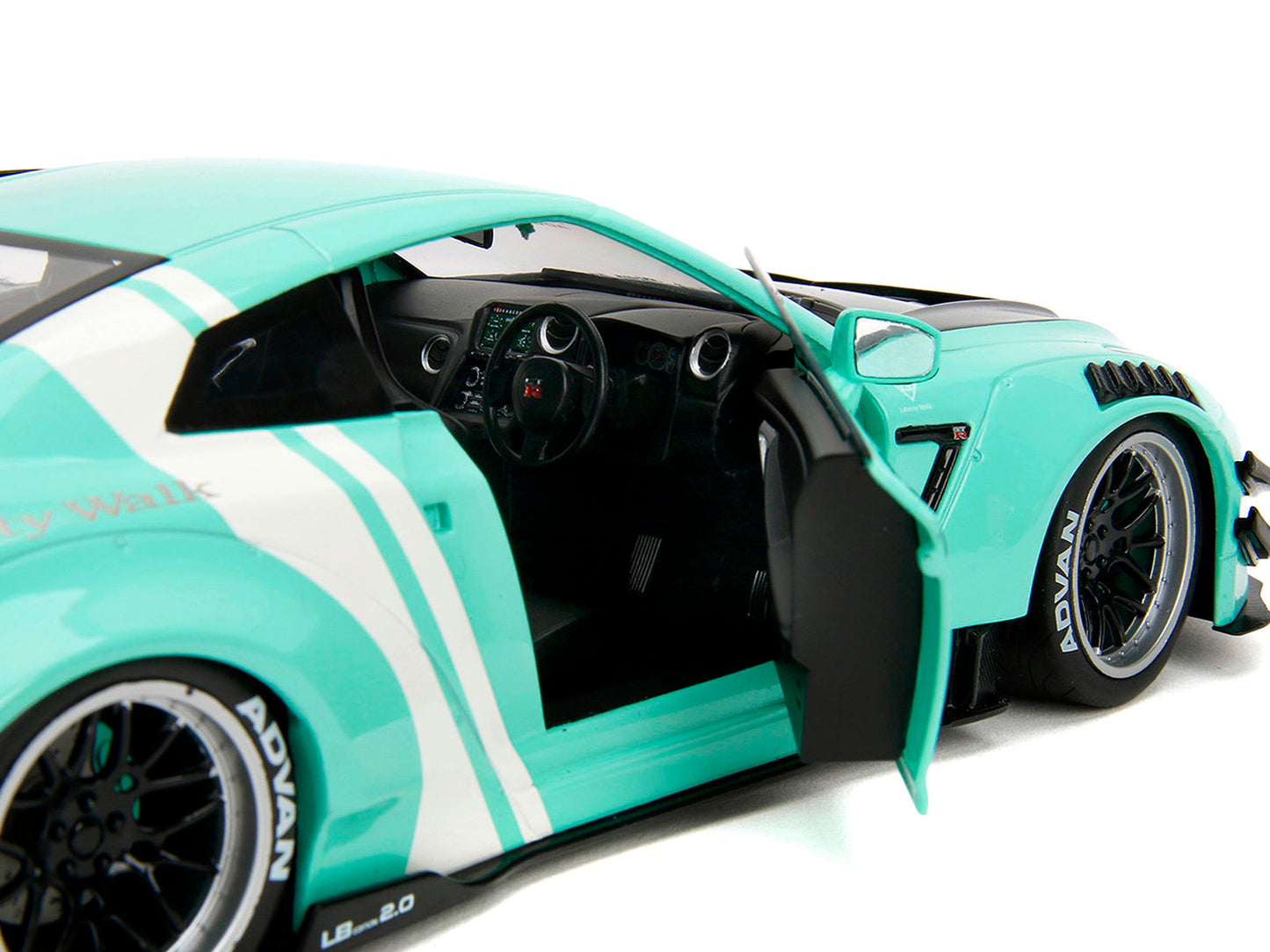 Nissan GT-R (R35) Liberty Walk Body Kit 2.0 RHD (Right Hand Drive) Light Blue with Black Hood and White Stripes "Pink Slips" Series 1/18 Diecast Model Car by Jada <h2>Nissan Jada</h2> <p>High-quality