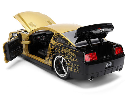 2008 Ford Shelby Mustang GT-500KR Gold Metallic and Black with Graphics "Bigtime Muscle" Series 1/24 Diecast Model Car by Jada <h2>2008 Jada</h2> <p>High-quality perfect for collectors enthusiasts. Fe