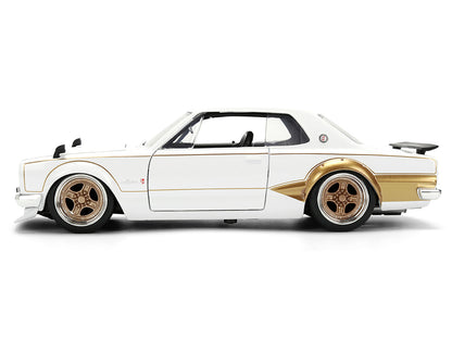 1971 Nissan Skyline 2000GT-R RHD (Right Hand Drive) White with Gold Graphics "JDM Tuners" Series 1/24 Diecast Model Car by Jada <h2>1971 Jada</h2> <p>High-quality perfect for collectors and enthusiast