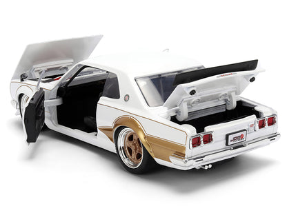 1971 Nissan Skyline 2000GT-R RHD (Right Hand Drive) White with Gold Graphics "JDM Tuners" Series 1/24 Diecast Model Car by Jada <h2>1971 Jada</h2> <p>High-quality perfect for collectors and enthusiast