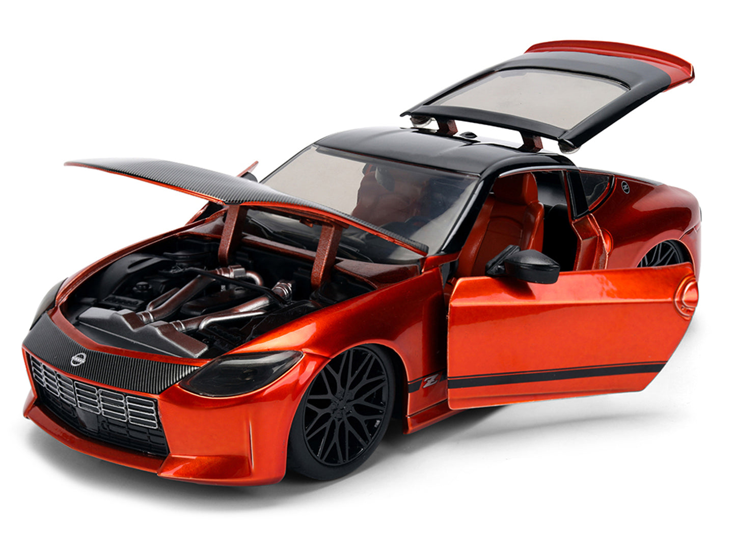 2023 Nissan Z Orange Metallic with Carbon Hood and Black Top "JDM Tuners" Series 1/24 Diecast Model Car by Jada <h2>2023 Jada</h2> <p>High-quality perfect for collectors enthusiasts. Features detailed
