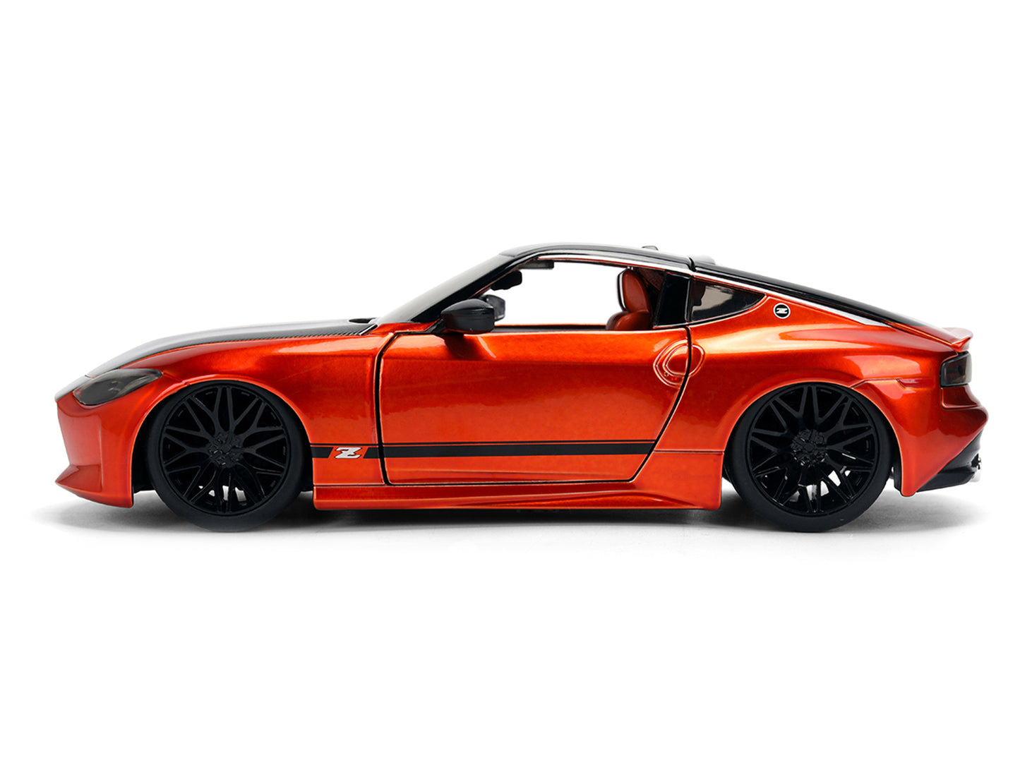 2023 Nissan Z Orange Metallic with Carbon Hood and Black Top "JDM Tuners" Series 1/24 Diecast Model Car by Jada <h2>2023 Jada</h2> <p>High-quality perfect for collectors enthusiasts. Features detailed