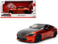 2023 Nissan Z Orange Metallic with Carbon Hood and Black Top "JDM Tuners" Series 1/24 Diecast Model Car by Jada <h2>2023 Jada</h2> <p>High-quality perfect for collectors enthusiasts. Features detailed