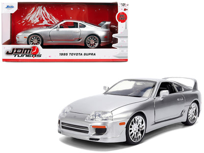 1995 Toyota Supra Silver Metallic "JDM Tuners" Series 1/24 Diecast Model Car by Jada <h2>1995 Jada</h2> <p>High-quality perfect for collectors and enthusiasts. Features detailed interior exterior craf