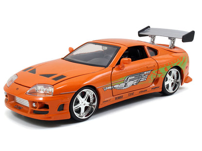 Dom's 1970 Dodge Charger R/T Black and Brian's Toyota Supra Orange with Graphics Set of 2 Cars "Fast & Furious 25th Anniversary" Furious" Series 1/24 Diecast Model by Jada <h2>Dom's Jada</h2> <p>High-