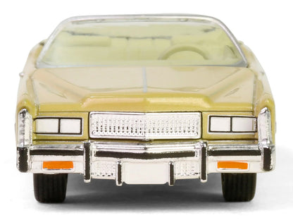 GreenLight 1975 Cadillac Eldorado Convertible Florentine Gold Firemist "Showroom Floor" Series 6 1/64 Diecast Model Car by <h2>1975 Greenlight</h2> <p>High-quality perfect for collectors and enthusias
