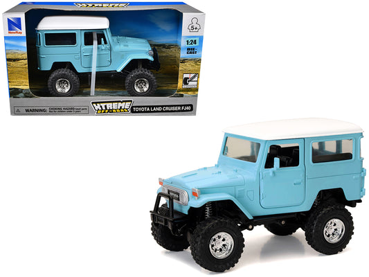 T&yota Land Cruiser FJ40 Light Blue with White Top "Xtreme Off-Road" Series 1/24 T&y Diecast Model by New Ray