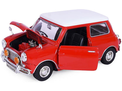 1961-1967 Morris Mini Cooper Red with White Top "Timeless Legends" 1/18 Diecast Model Car by Motormax <h2>1961-1967 Motormax</h2> <p>High-quality perfect for collectors and enthusiasts. Features detai
