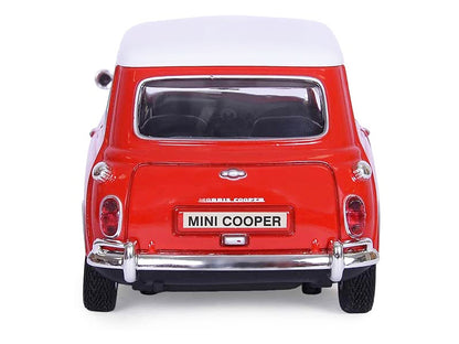 1961-1967 Morris Mini Cooper Red with White Top "Timeless Legends" 1/18 Diecast Model Car by Motormax <h2>1961-1967 Motormax</h2> <p>High-quality perfect for collectors and enthusiasts. Features detai