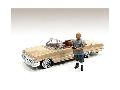 "Lowriderz" Figurine I for 1/18 Scale Models by American Diorama <h2>"Lowriderz" Diorama</h2> <p>High-quality diecast model car perfect collectors and enthusiasts. Features detailed interior exterior