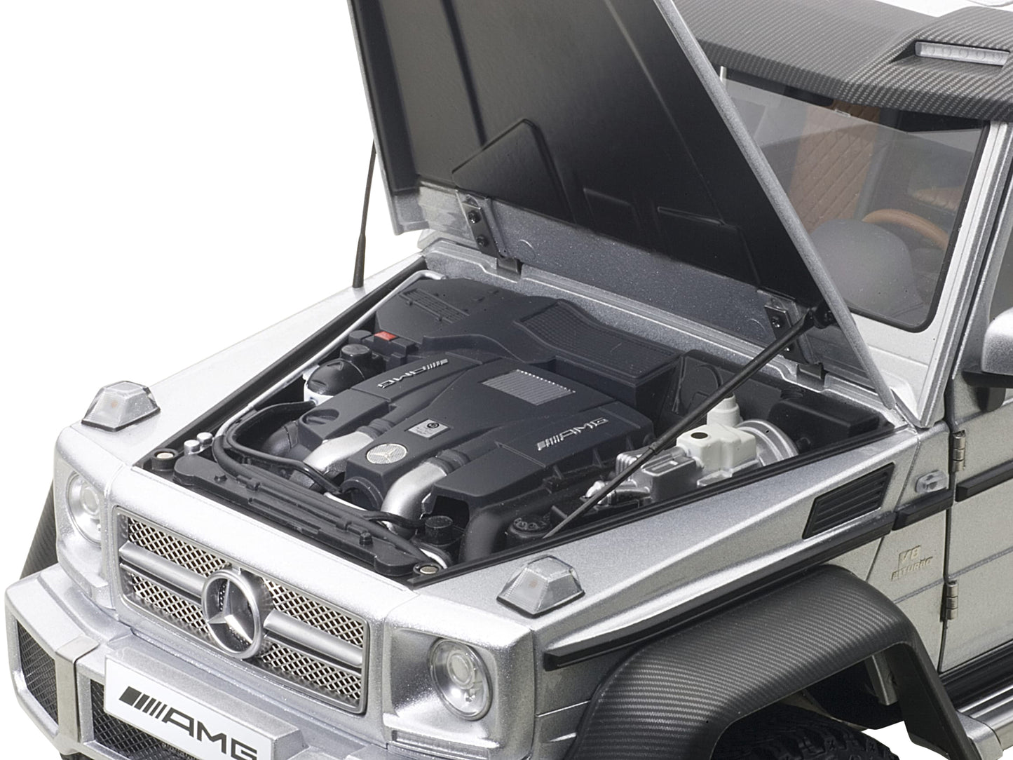 Mercedes G63 AMG 6X6 Silver 1/18 Model Car by Autoart <h2>Mercedes Autoart</h2> <p>High-quality diecast perfect for collectors and enthusiasts. Features detailed interior exterior craftsmanship, reali