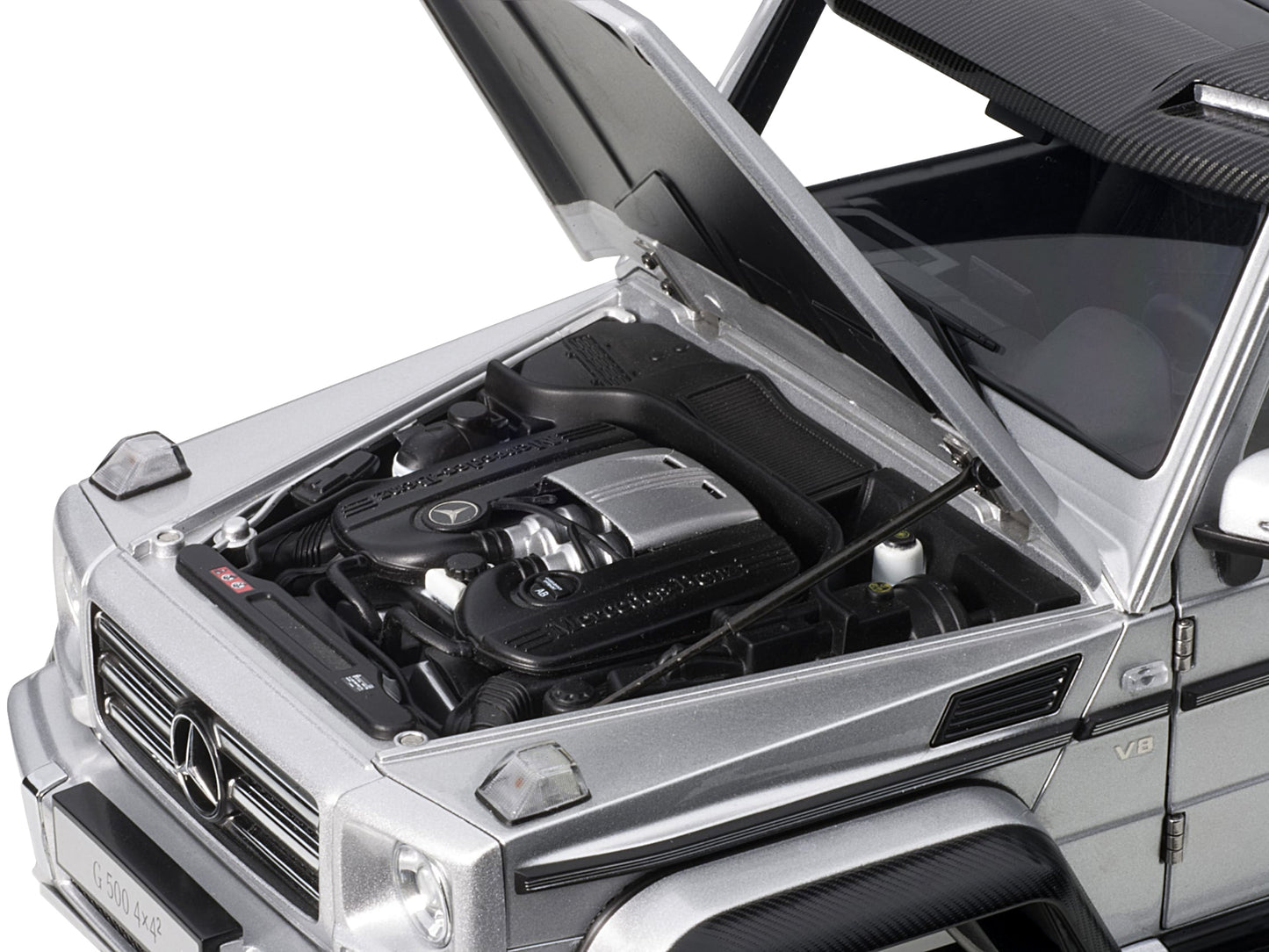 Mercedes Benz G500 4X4 2 Silver 1/18 Model Car by Autoart <h2>Mercedes Autoart</h2> <p>High-quality diecast perfect for collectors and enthusiasts. Features detailed interior exterior craftsmanship, r