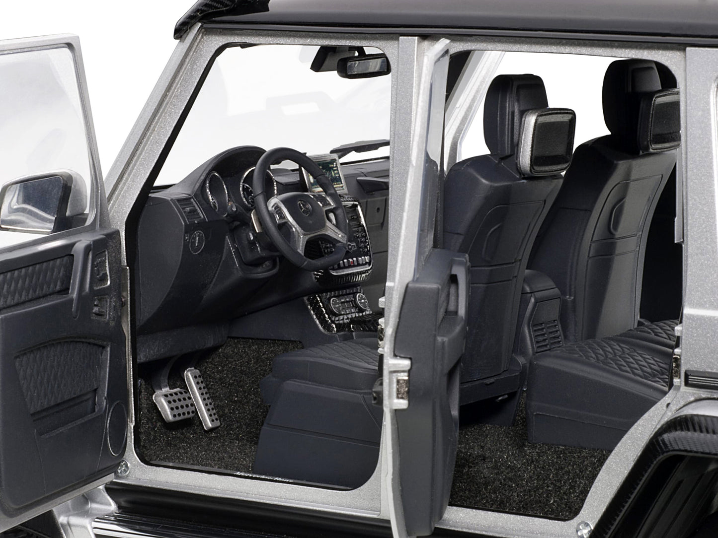 Mercedes Benz G500 4X4 2 Silver 1/18 Model Car by Autoart <h2>Mercedes Autoart</h2> <p>High-quality diecast perfect for collectors and enthusiasts. Features detailed interior exterior craftsmanship, r