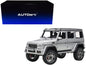 Mercedes Benz G500 4X4 2 Silver 1/18 Model Car by Autoart <h2>Mercedes Autoart</h2> <p>High-quality diecast perfect for collectors and enthusiasts. Features detailed interior exterior craftsmanship, r