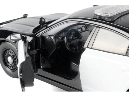 2023 Dodge Charger Pursuit Police Car Black and White "Law Enforcement Public Service" Series 1/24 Diecast Model by Motormax <h2>2023 Motormax</h2> <p>High-quality perfect for collectors enthusiasts.