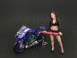 Umbrella Girl I Figure For 1:24 Scale Models by American Diorama <h2>Umbrella Diorama</h2> <p>High-quality diecast model car perfect collectors and enthusiasts. Features detailed interior exterior cra