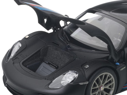 Porsche 918 Spyder Weissach Package Black/ Martini Livery #15 1/18 Model Car by Autoart <h2>Porsche Autoart</h2> <p>High-quality diecast perfect for collectors and enthusiasts. Features detailed inter