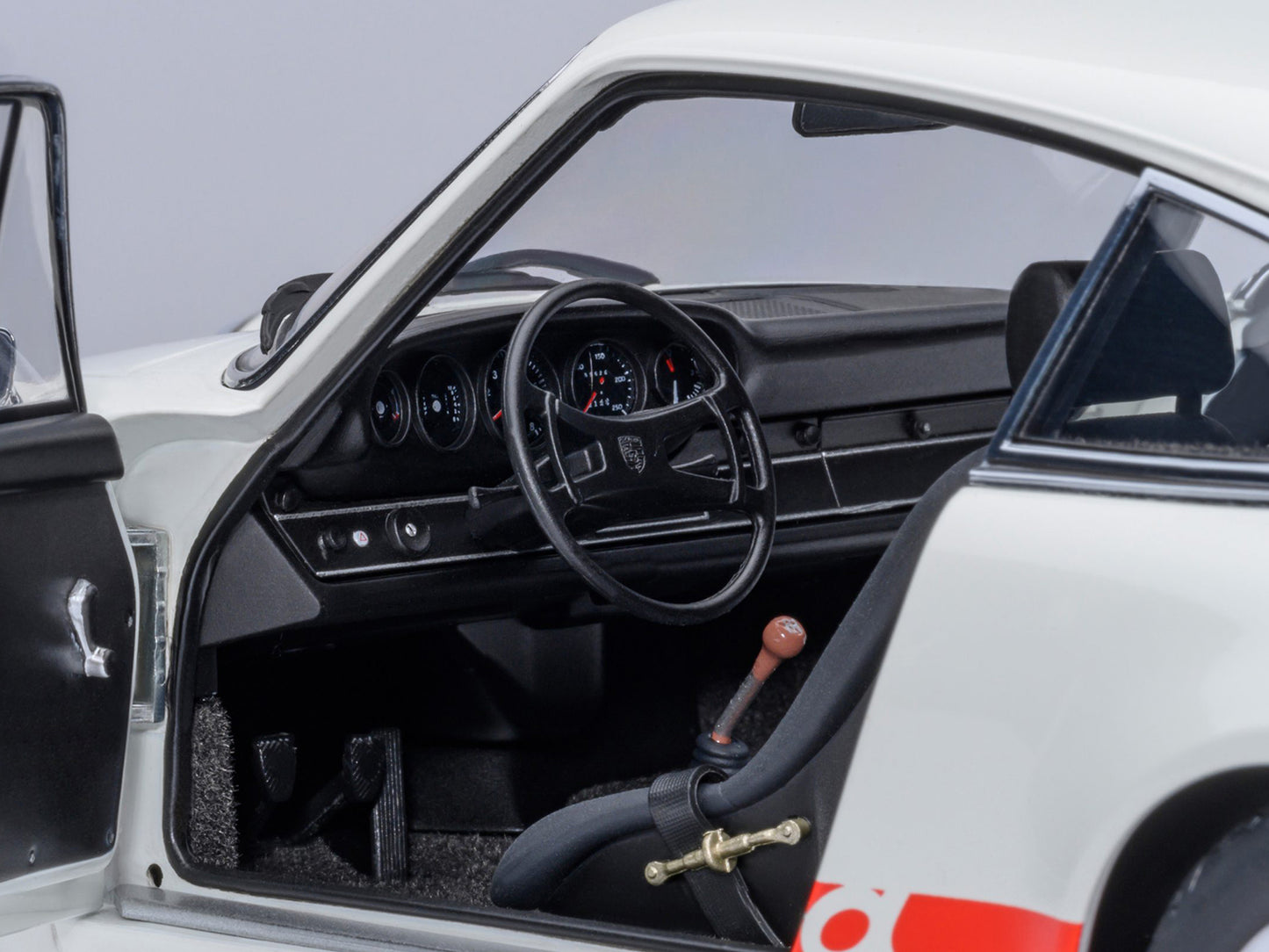 Porsche 911 Carrera 2.7 RS Grand Prix White with Red Stripes and Wheels 1/18 Model Car by Autoart <h2>Porsche Autoart</h2> <p>High-quality diecast perfect for collectors enthusiasts. Features detailed