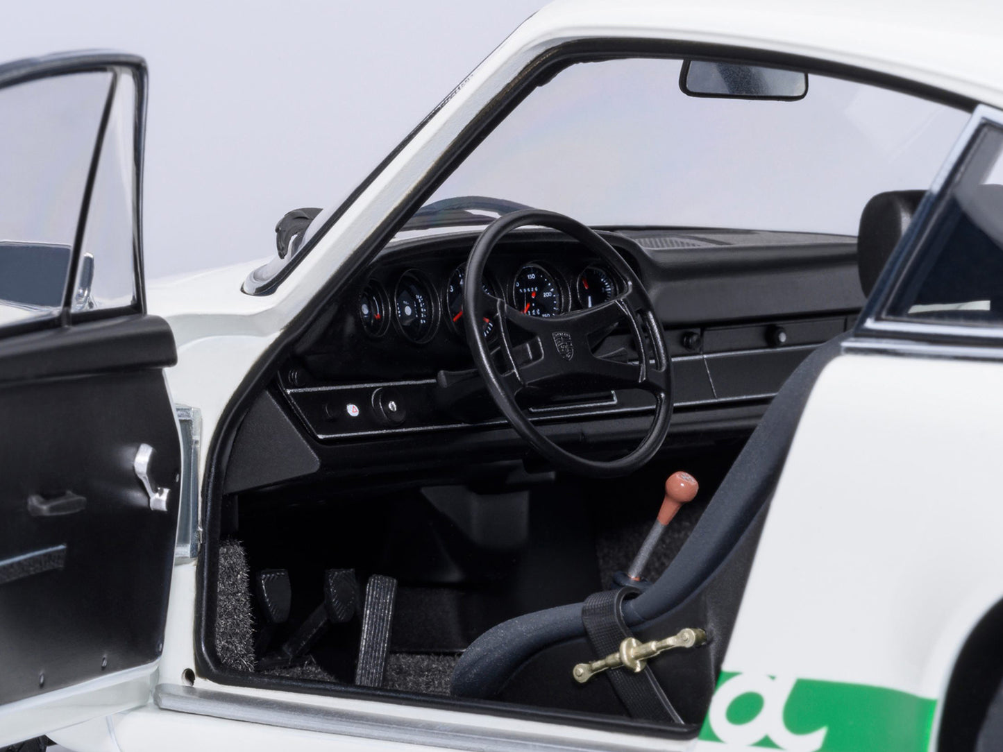 Porsche 911 Carrera 2.7 RS Grand Prix White with Green Stripes and Wheels 1/18 Model Car by Autoart <h2>Porsche Autoart</h2> <p>High-quality diecast perfect for collectors enthusiasts. Features detail