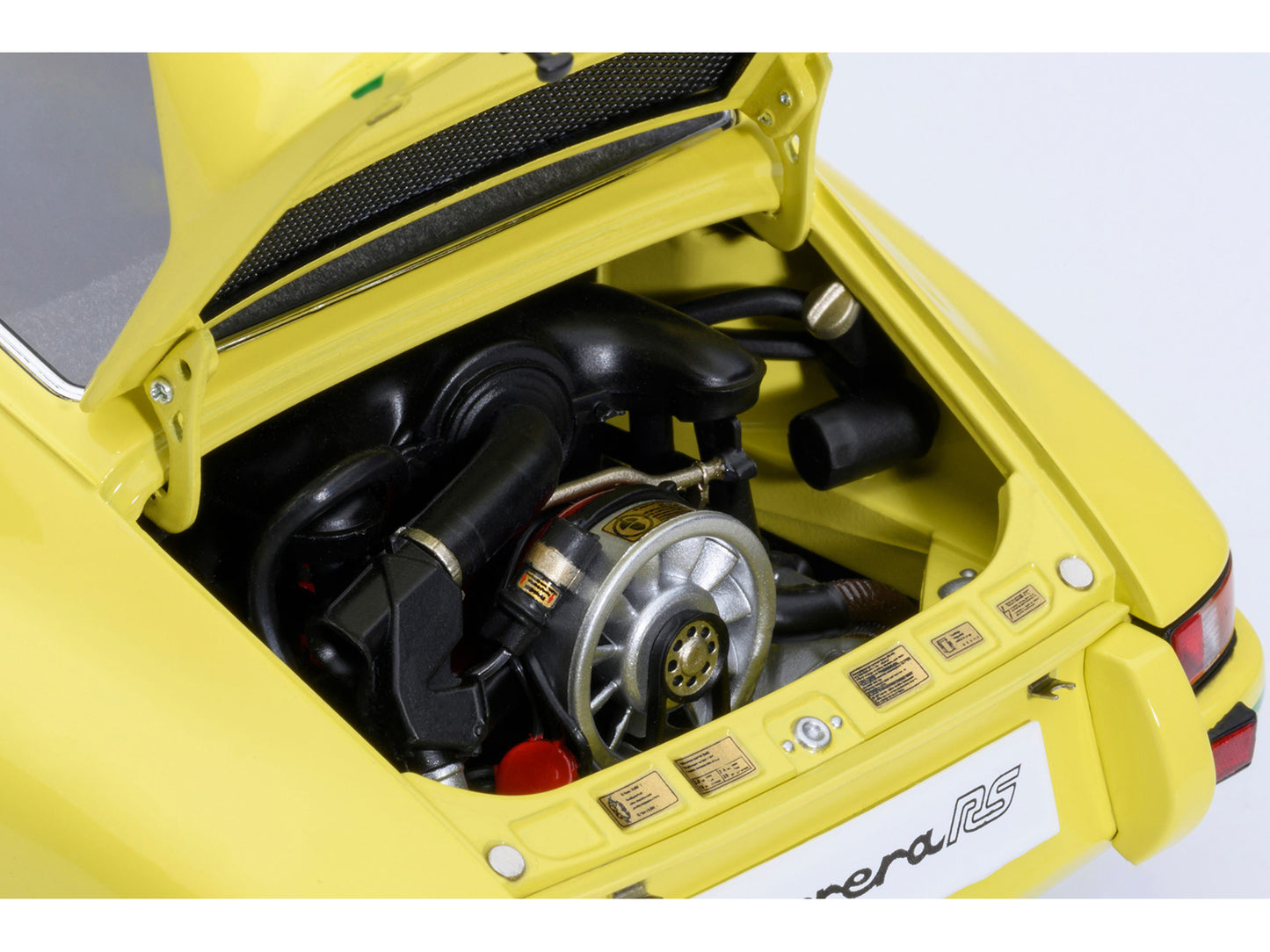 Porsche 911 Carrera 2.7 RS Light Yellow with Green Stripes and Wheels 1/18 Model Car by Autoart <h2>Porsche Autoart</h2> <p>High-quality diecast perfect for collectors enthusiasts. Features detailed i