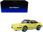 Porsche 911 Carrera 2.7 RS Light Yellow with Green Stripes and Wheels 1/18 Model Car by Autoart <h2>Porsche Autoart</h2> <p>High-quality diecast perfect for collectors enthusiasts. Features detailed i