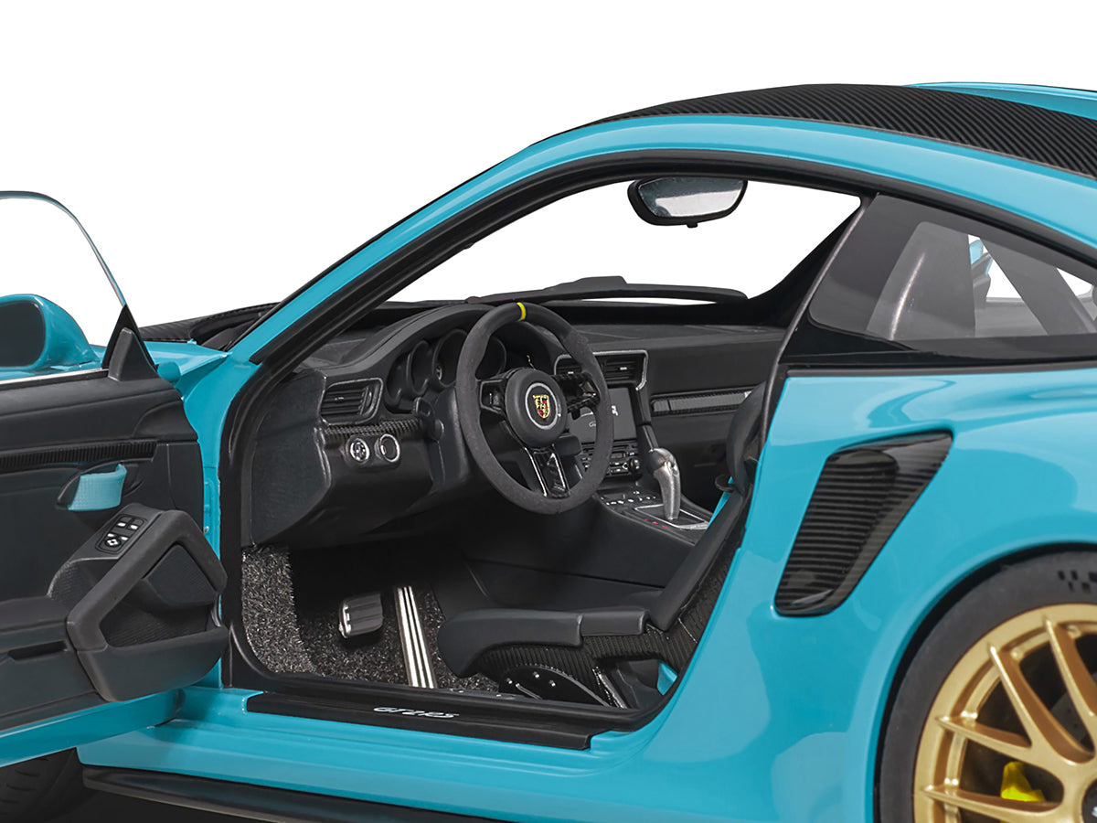 Porsche 911 (991.2) GT2 RS Weissach Package Miami Blue with Carbon Stripes 1/18 Model Car by Autoart <h2>Porsche Autoart</h2> <p>High-quality diecast perfect for collectors and enthusiasts. Features d
