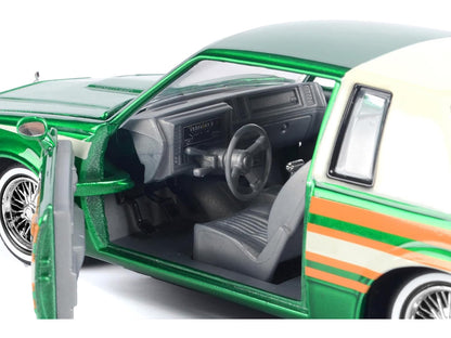 1987 Buick Regal 3.8 SFI Turbo Green Metallic and Cream with Graphics "Get Low" Series 1/24 Diecast Model Car by Motormax <h2>1987 Motormax</h2> <p>High-quality perfect for collectors enthusiasts. Fea