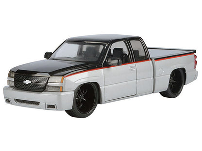 2006 Chevrolet Silverado Custom Pickup Truck Silver Metallic and Black with Red Stripes "Die-Cast Collection" Series 1/25 Diecast Model Car by Motormax <h2>2006 Motormax</h2> <p>High-quality perfect f