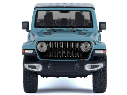 2021 Jeep Gladiator Rubicon (Closed Top) Pickup Truck Blue with Black Top 1/27 Diecast Model Car by Motormax <h2>2021 Motormax</h2> <p>High-quality perfect for collectors and enthusiasts. Features det