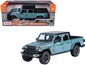 2021 Jeep Gladiator Rubicon (Closed Top) Pickup Truck Blue with Black Top 1/27 Diecast Model Car by Motormax <h2>2021 Motormax</h2> <p>High-quality perfect for collectors and enthusiasts. Features det