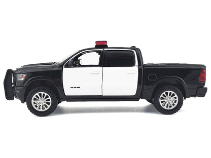 2019 RAM 1500 Laramie Crew Cab Pickup Truck Black and White with Flashing Light Bar Front Rear Lights Sounds 1/27 Diecast Model Car by Motormax <h2>2019 Motormax</h2> <p>High-quality perfect for colle