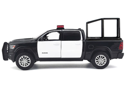 2019 RAM 1500 Laramie Crew Cab Pickup Truck with Bed Cage Black and White Flashing Light Bar Front Rear Lights Sounds 1/27 Diecast Model Car by Motormax <h2>2019 Motormax</h2> <p>High-quality perfect