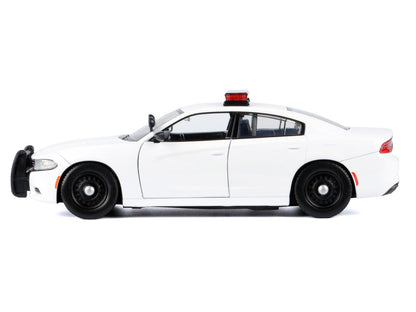 2023 Dodge Charger Pursuit Police Car Unmarked White with Flashing Light Bar Front and Rear Lights 2 Sounds "Builder's Kit" 1/24 Diecast Model by Motormax <h2>2023 Motormax</h2> <p>High-quality perfec