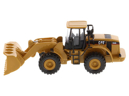 CAT Caterpillar 950G Series II Wheel Loader Yellow 1/87 (HO) Diecast Model by Masters <h2>CAT Masters</h2> <p>High-quality car perfect for collectors and enthusiasts. Features detailed interior exteri