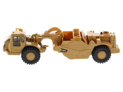 CAT Caterpillar 627G Auger Scraper Yellow 1/87 (HO) Diecast Model by Masters <h2>CAT Masters</h2> <p>High-quality car perfect for collectors and enthusiasts. Features detailed interior exterior crafts