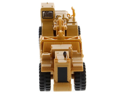 CAT Caterpillar 627G Auger Scraper Yellow 1/87 (HO) Diecast Model by Masters <h2>CAT Masters</h2> <p>High-quality car perfect for collectors and enthusiasts. Features detailed interior exterior crafts