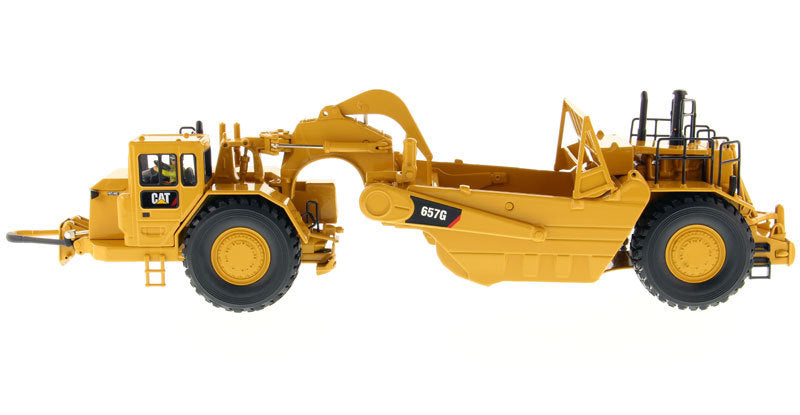 CAT Caterpillar 657 G Wheel Tractor Scraper with Operator "Core Classics Series" 1/50 Diecast Model by Masters <h2>CAT Masters</h2> <p>High-quality car perfect for collectors and enthusiasts. Features