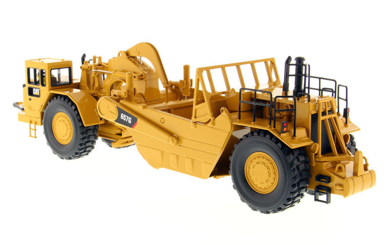 CAT Caterpillar 657 G Wheel Tractor Scraper with Operator "Core Classics Series" 1/50 Diecast Model by Masters <h2>CAT Masters</h2> <p>High-quality car perfect for collectors and enthusiasts. Features