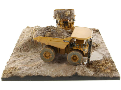 CAT Caterpillar 994K Wheel Loader and 797 Mining Truck Yellow (Weathered) Set of 2 Pieces "Weathered Series" 1/125 Diecast Model by Masters <h2>CAT Masters</h2> <p>High-quality car perfect for collect