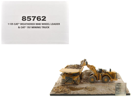 CAT Caterpillar 994K Wheel Loader and 797 Mining Truck Yellow (Weathered) Set of 2 Pieces "Weathered Series" 1/125 Diecast Model by Masters <h2>CAT Masters</h2> <p>High-quality car perfect for collect